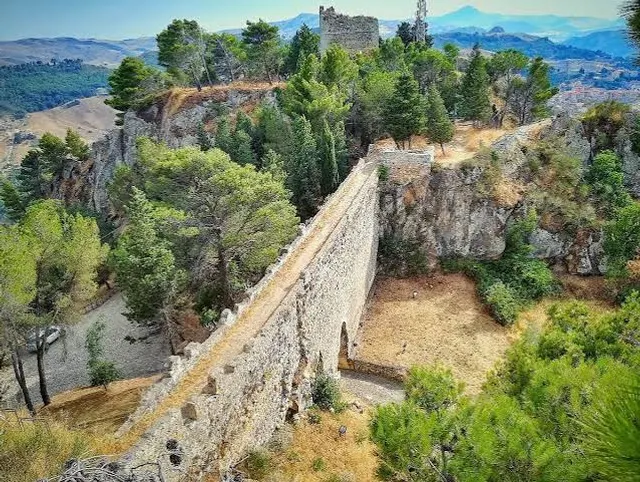 The Castle's curtain wall along the ridge of the rock, with the Norman tower in the background