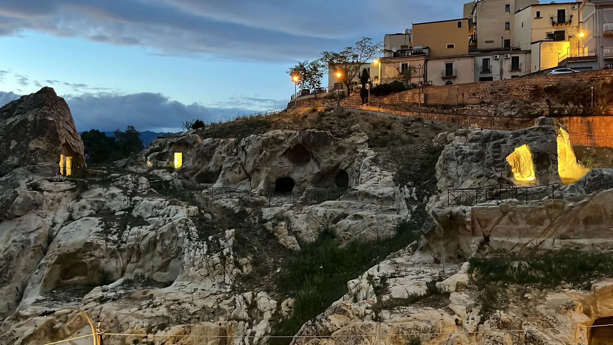 Nicosia's rock dwellings lit at dusk